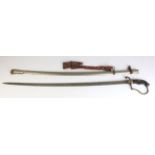 Sword: A WW1 Turkish Artillery Officers sword in its steel scabbard with leather attachments. Nicely