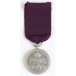 Medal of The Order of The British Empire on its purple (Civil Award) ribbon. Only 2,000 awarded.