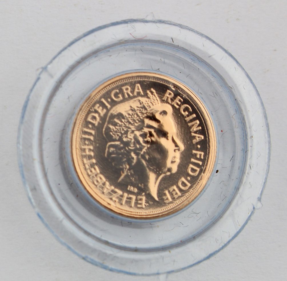 Quarter Sovereign 2009 BU in a small capsule.