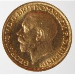 GB Sovereign 1911 EF but on closer inspection seems to be a good forgery, (unknown gold content)