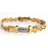 Yellow Metal (tests 15ct) Bracelet set with 13 Diamonds approx 0.65ct weight. Weight 33g