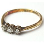18ct Gold three stone Diamond Ring size M weight 1.9 grams