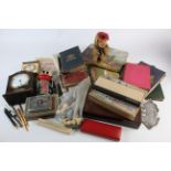 Miscellania. A collection of miscellaneous items, including pens, clocks, cigarette cards, books