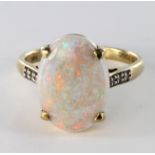 14ct Gold Ring set with 3.37ct weight Opal and Diamond shoulders comes with COA certificate weight