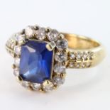 Yellow Metal Ring (tests 10ct) with Blue/white synthetic stones size P weight 5.3 grams