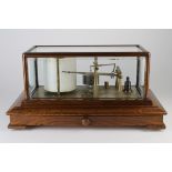 Negretti & Zambra oak cased barograph (R/32458), with bevelled glass, total height 20.5cm, width