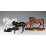 Beswick Spirit of Affection, horse and foal, mounted on oak plinth, total height 20cm approx.,