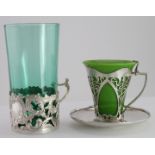 Two glass tea / coffee cups each in hallmarked silver holder, one with hallmarked silver (non