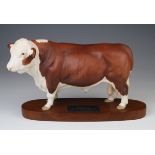 Beswick Polled Hereford Bull Connoisseur, mounted on oak plinth, total height 18.5cm approx.