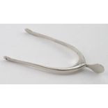 Silver Wishbone sugar tongs. Maker - J. Swan & Sons, Birmingham, 1949. Weight ¼ oz