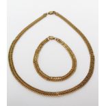 9ct Gold matching Bracelet and 16 inch Necklace weight 14.0g