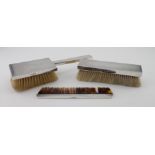Art Deco silver brush set comprising two brushes and a comb - very good gauge of silver. Hallmarked,