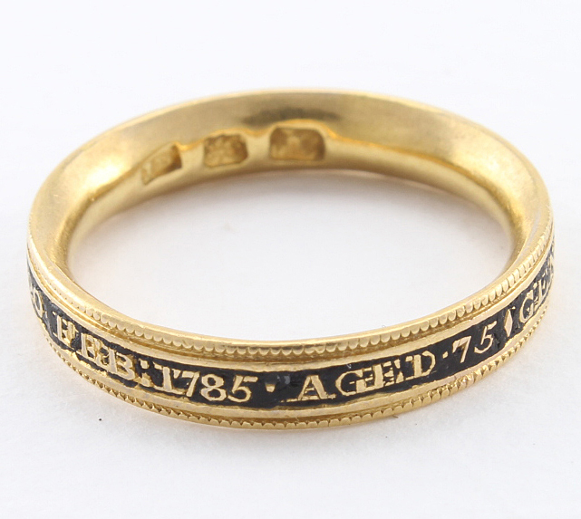 Georgian gold (tests as 18ct) memorial ring with black enamel, outer edge reads 'Genl. Philip