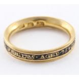 Georgian gold (tests as 18ct) memorial ring with black enamel, outer edge reads 'Genl. Philip