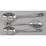Three Georg Jensen silver spoons - one marked "GJ Denmark, Sterling". two others are marked Georg