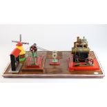 Mamod & Wilesco. A display board containing six items including two mamod stationary engines, a