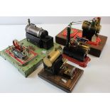 Five live steam stationary engines, including one by Signalling Equipment Ltd (boxed), two by