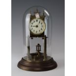 Brass anniversary clock, circa early 20th century, with glass dome (damaged)