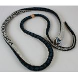 Turkish black, blue & white prisoner of war bead snake, dated 1918 N, small section of damage (