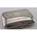 Silver cigarette case hallmarked for Walker & Hall Birmingham 1939. Weight 3½ oz approx.