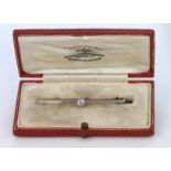 9ct Gold/Platinum Bar brooch set with Diamond (approx 0.25ct weight) weight 2.5g in original