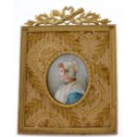 Portrait miniature, oil on ivory (?), depicting a head and shoulders portrait of a women, circa 19th