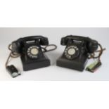 Two vintage black bakelite telephones