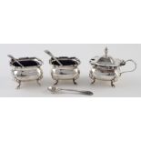 Silver cruet set of mustard and two salts hallmarked for London, 1919/20 plus three small silver