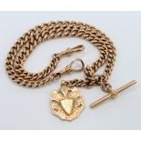 Hallmarked 9ct Gold pocket watch chain with "T" Bar & 9ct sporting medal attached, length approx.