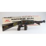Japanese Tada New Kick Action tinplate battery operated machine gun, contained in original box
