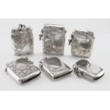Six silver vesta cases, comprising four with Birmingham hallmarks & two stamped '925', including one