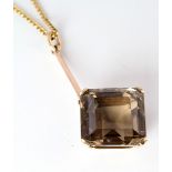 9ct Gold Smoky Quartz pendant on a 16 inch fine chain weight 8.1g