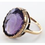 Yellow metal (tests 14ct Gold) Amethyst Ring size I weight 5.8g