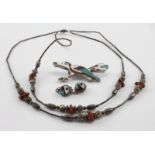 Three pieces of North American (Navajo) jewellery, comprising a necklace, a pair of earrings and