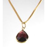 9ct Gold Garnet pendant on a fine 16 inch chain weight 3.3g