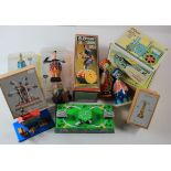 Tinplate. A collection of approximately eighteen tinplate models, some boxed