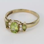 14kt Gold Ring set with Peridot and Diamonds size P weight 2.3g