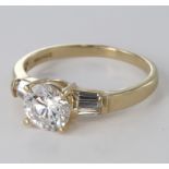9ct Gold QVC Ring set with Round and Baguette CZ size O weight 3.0g