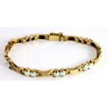 14ct Gold Bracelet set with 14 Opals weight 14.1 grams