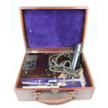 Early Violet Ray High-Frequency Generator, contained within a wooden mahogany coloured box, with