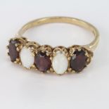 9ct Gold Garnet and Opal Ring size P weight 2.7g