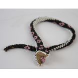 WWI Turkish black, pink & white prisoner of war bead snake, length 39cm approx.