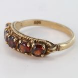 9ct Gold Ring set with 5 Garnets size M weight 2.8 grams