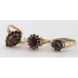 Three 9ct Gold Garnet set Rings weight 7.8g