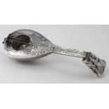 Victorian silver inkwell and quill holder in the form of a lute with embossed decoration, hallmarked
