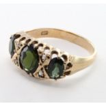 9ct Gold Peridot set Ring size M weight 3.7g