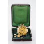 Boxed Ladies 9ct gold open face pocket watch, the gilt engine turned and foliage engraved dial