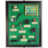 St Andrews reproduction glass cased golf display, including different types of early golf balls,