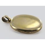 Yellow metal (tests 14ct Gold) Photograph Locket weight 13.2g