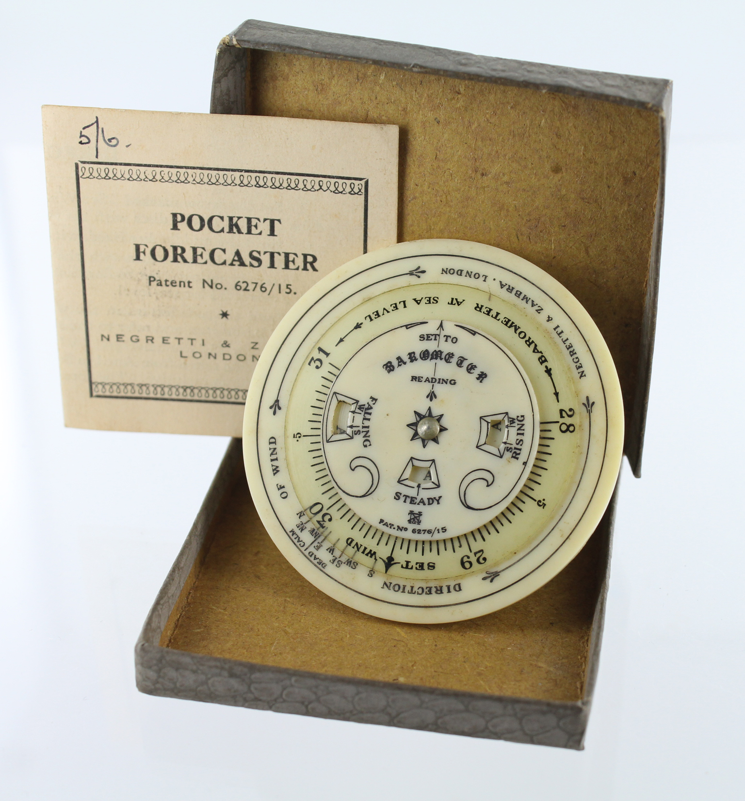 Negretti & Zambra pocket forecaster, with rotating discs, 55mm diameter, housed in original box with